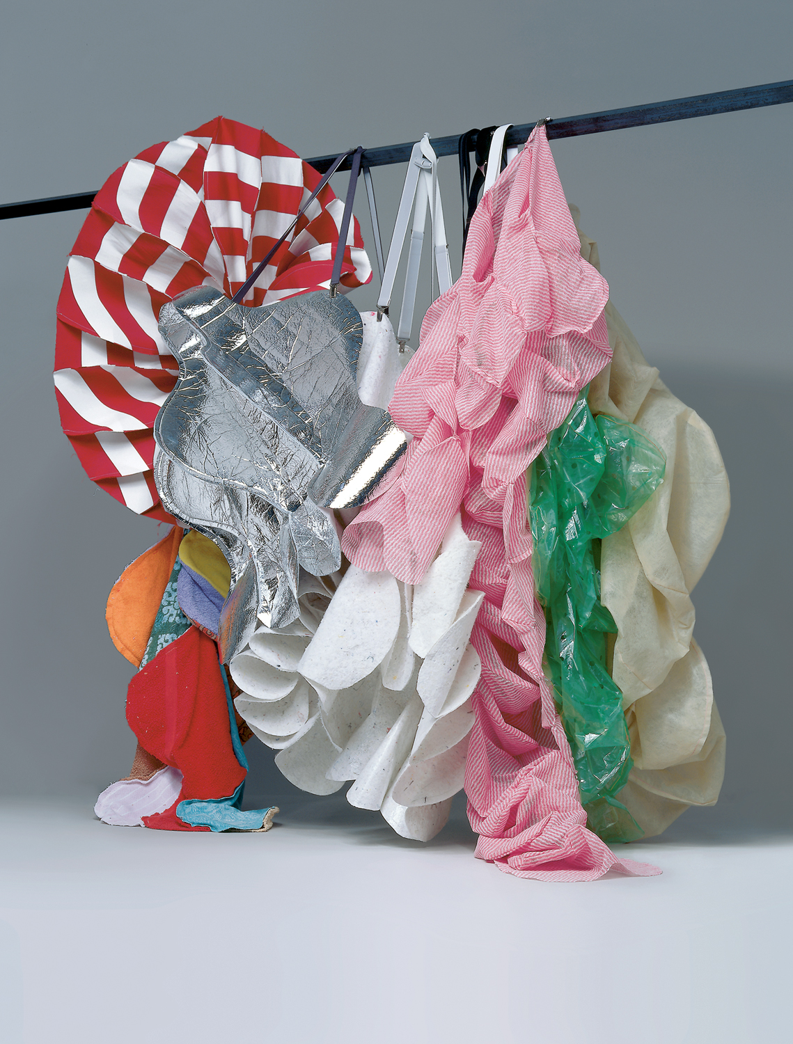 textile objects with braces to fasten 'Anschnallen'