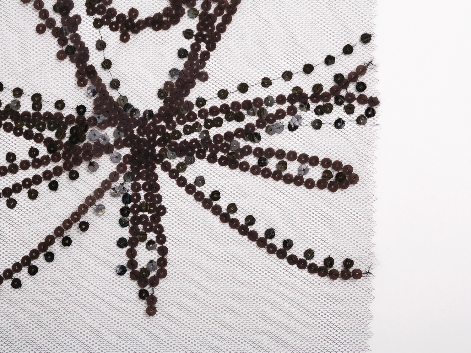 embroidery on sequined tulle