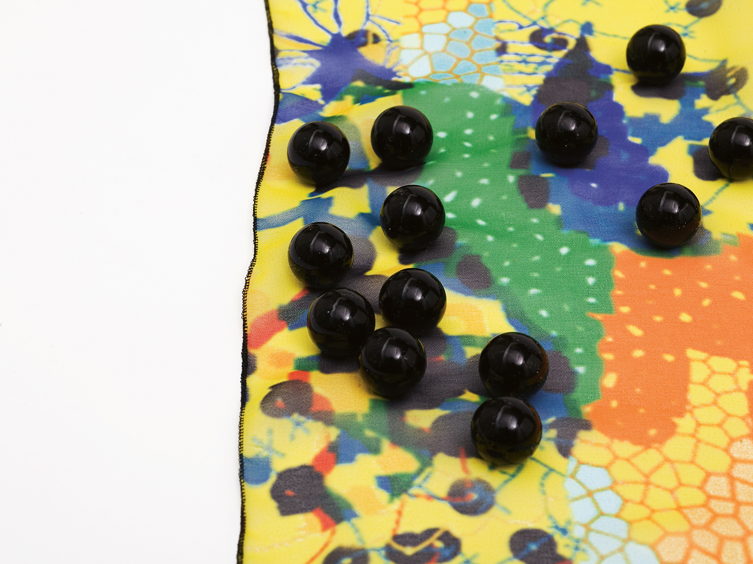 black 'Coco' pearls as application (front side)